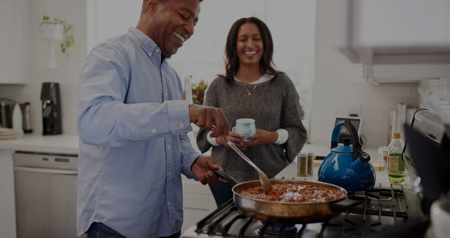 Happy people cooking together.